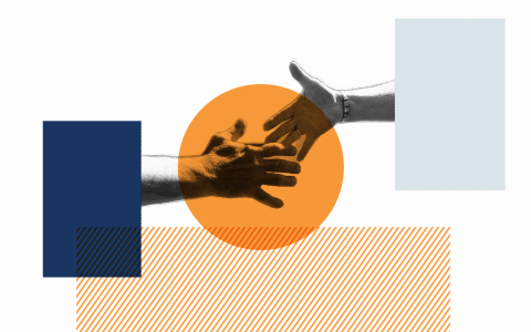 Two hands reaching for one another with a geometric background