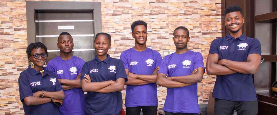 6 Ashoka Young Changemakers from Nigeria standing in a line smiling and all with arms crossed