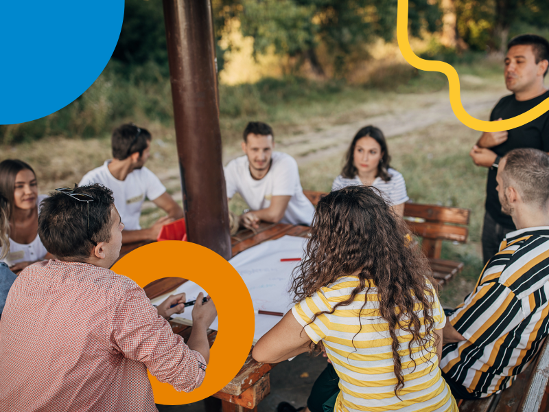 Grouop of young people by the table