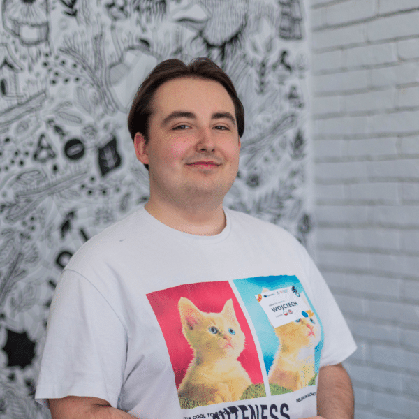Young man wearing a t-shirt with a cat
