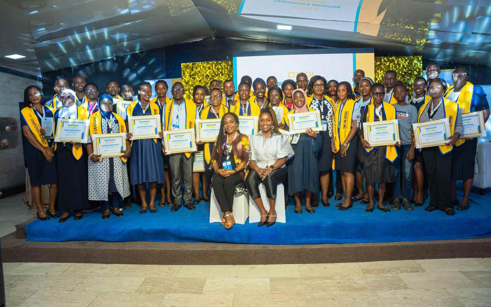 A group of teachers graduating from a year long program